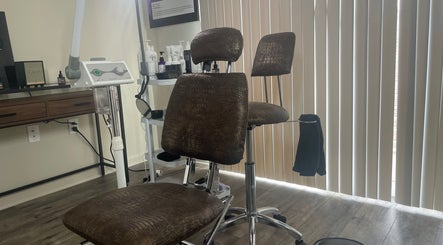 Modern spa chair and equipment at FEW FACED SELF, Macon, Georgia, US, offering a tranquil experience.