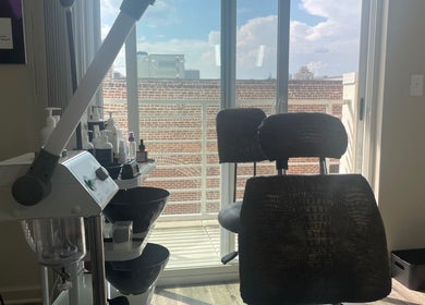 Relaxing spa room at FEW FACED SELF in Macon, Georgia, US with modern equipment and a peaceful atmosphere.