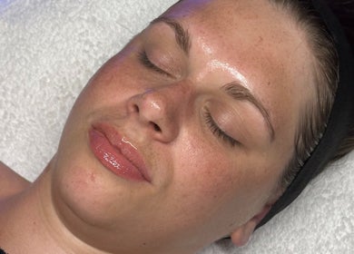 Relaxed face at Signature Skin in Little Massingham, England during a soothing wellness treatment.