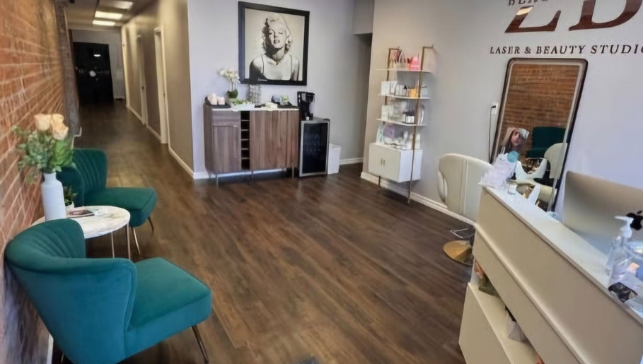 Elegant waiting area at Silk and Honey Body Sugaring, Pembroke, Ontario, CA featuring modern decor and comfy seating.