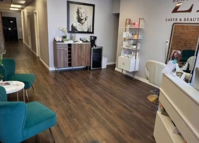Elegant waiting area at Silk and Honey Body Sugaring, Pembroke, Ontario, CA featuring modern decor and comfy seating.