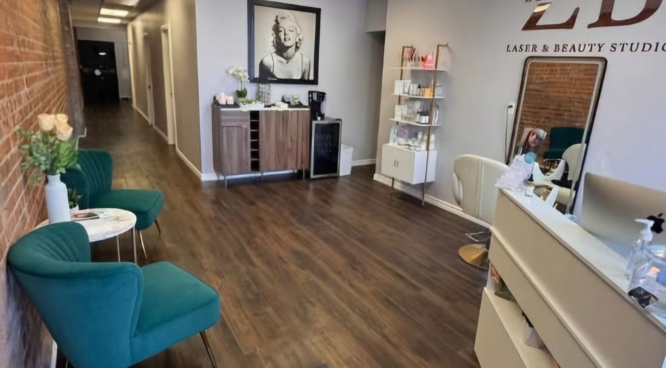 Elegant waiting area at Silk and Honey Body Sugaring, Pembroke, Ontario, CA featuring modern decor and comfy seating.