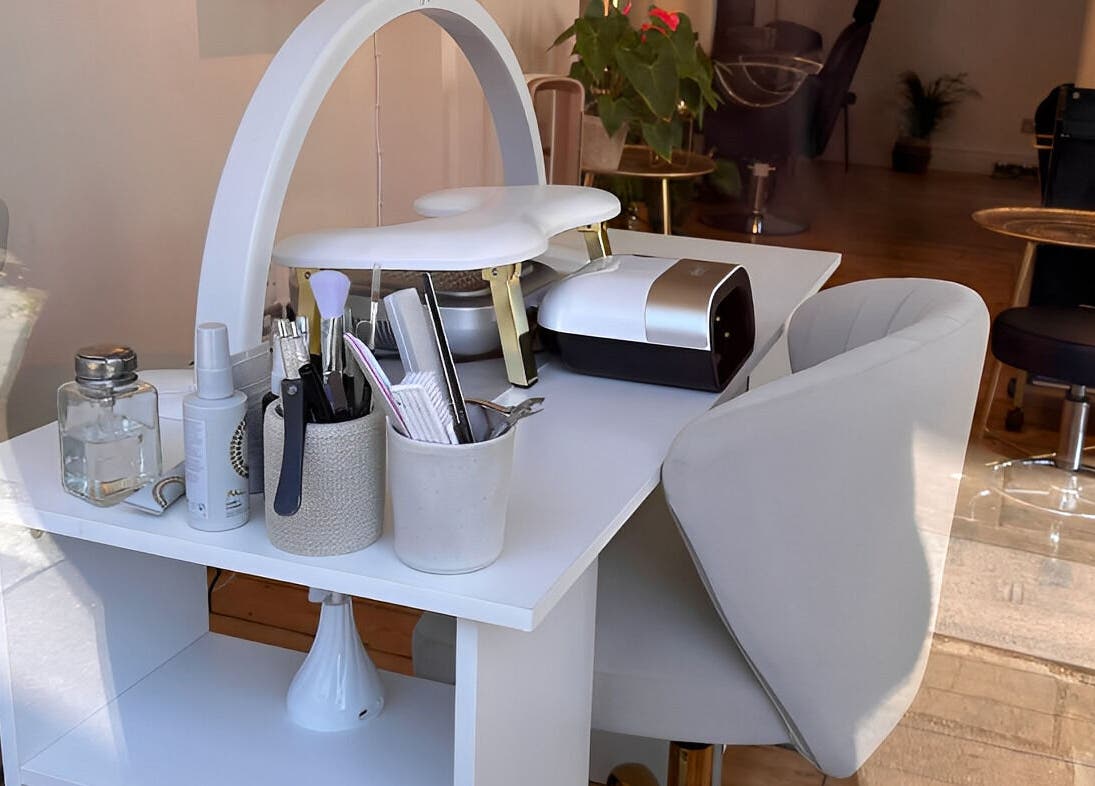 Manicure station at Dreia’s Nails in London, England, GB featuring tools and modern decor.