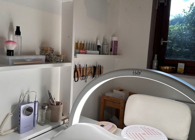 Dreia’s Nails workspace with tools and decor in London, England, GB, showcasing a serene and professional environment.