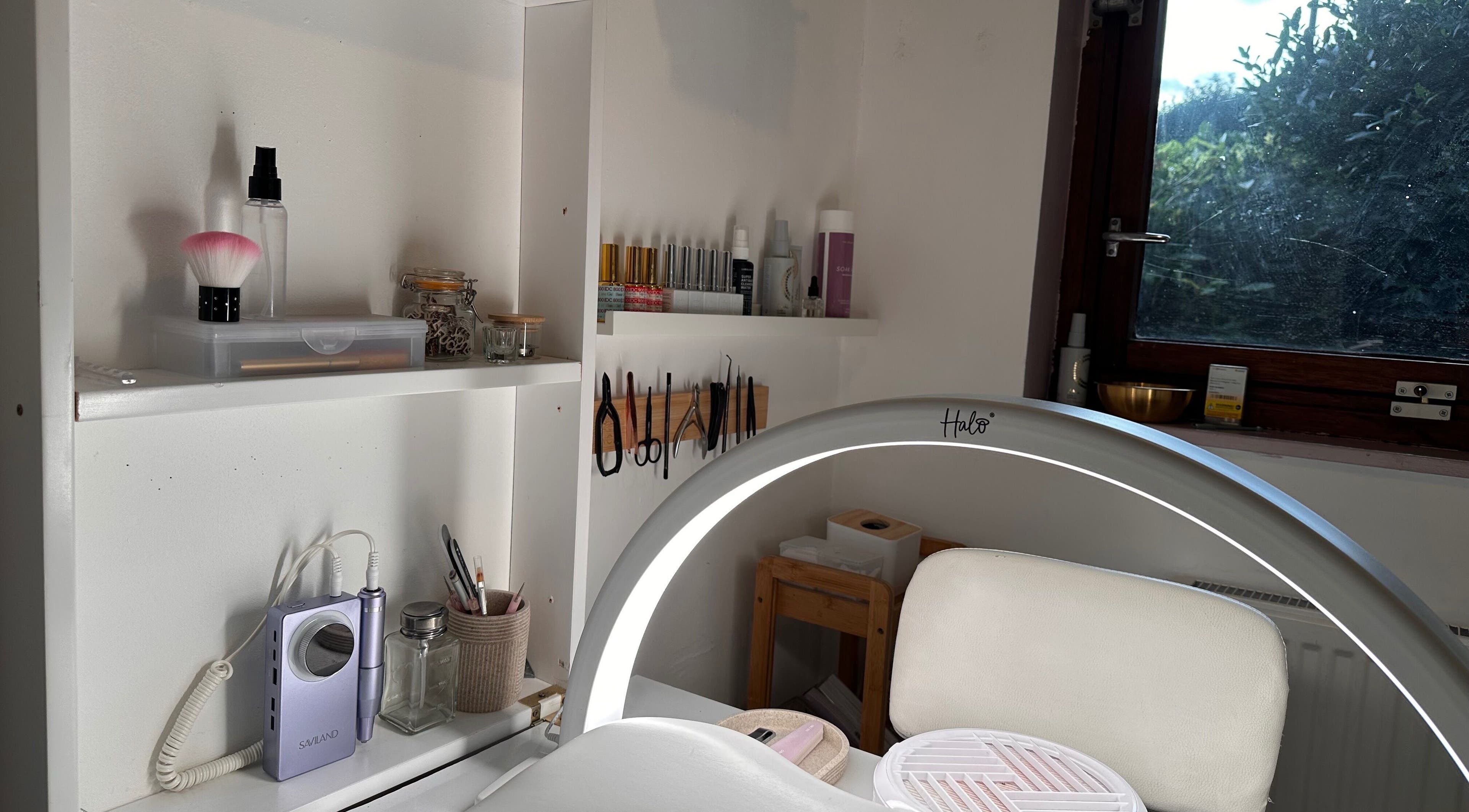 Dreia’s Nails workspace with tools and decor in London, England, GB, showcasing a serene and professional environment.