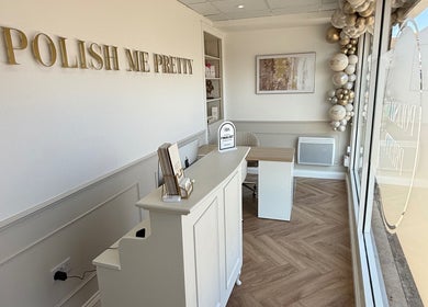 Elegant reception area at The Head Haven, Portsmouth, England, GB with neutral decor and stylish furnishings.