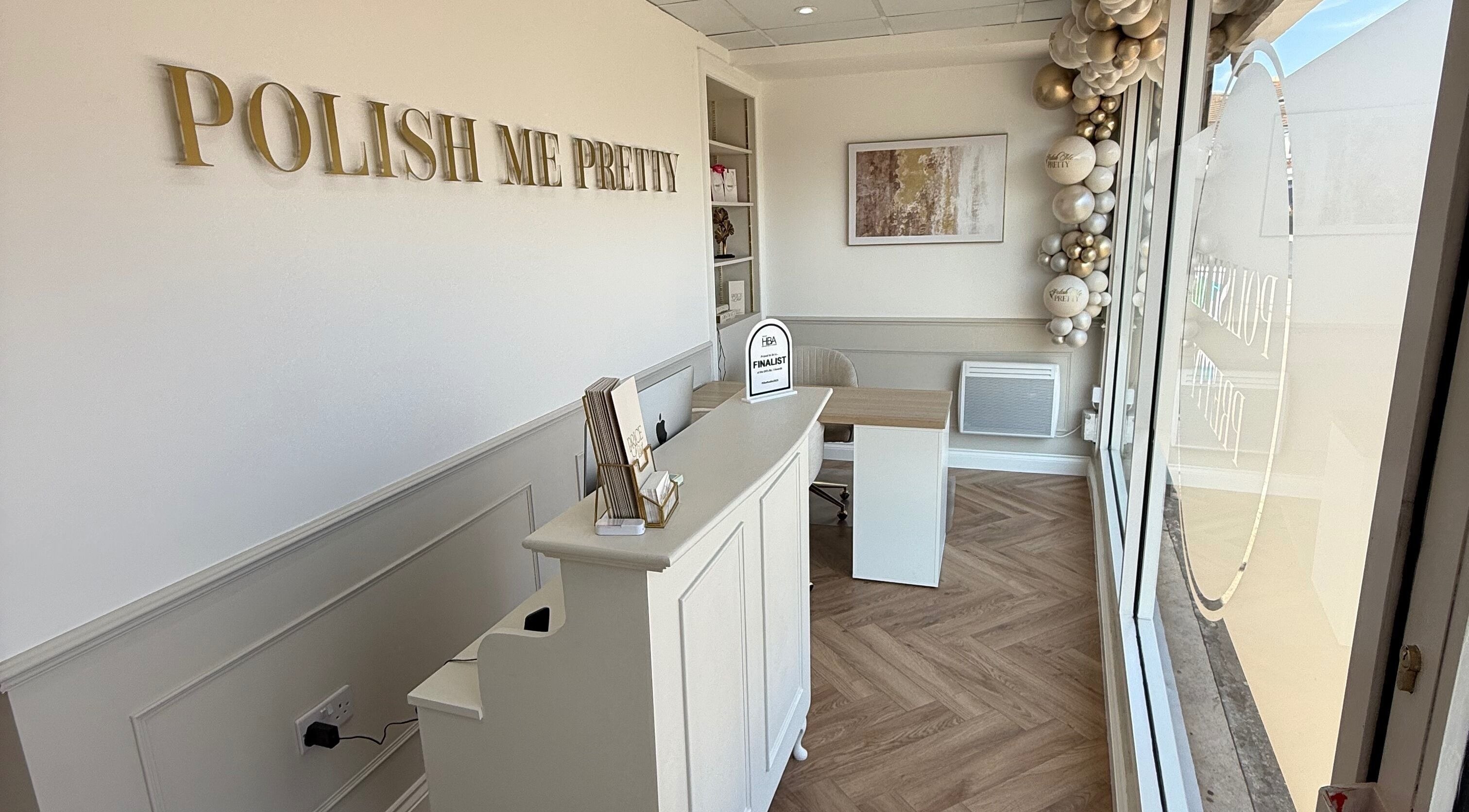 Elegant reception area at The Head Haven, Portsmouth, England, GB with neutral decor and stylish furnishings.