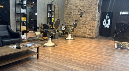 Elegant barber chairs and decor at Facelook in Doha, Doha Municipality, QA for a premium grooming experience.