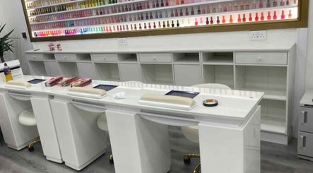 Amazing Nails & Spa salon in Dublin, County Dublin, IE showcases a chic manicure station with colorful polish display.