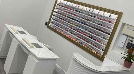 Amazing Nails & Spa in Dublin, County Dublin, IE offers a vibrant selection of nail polish colors displayed elegantly.