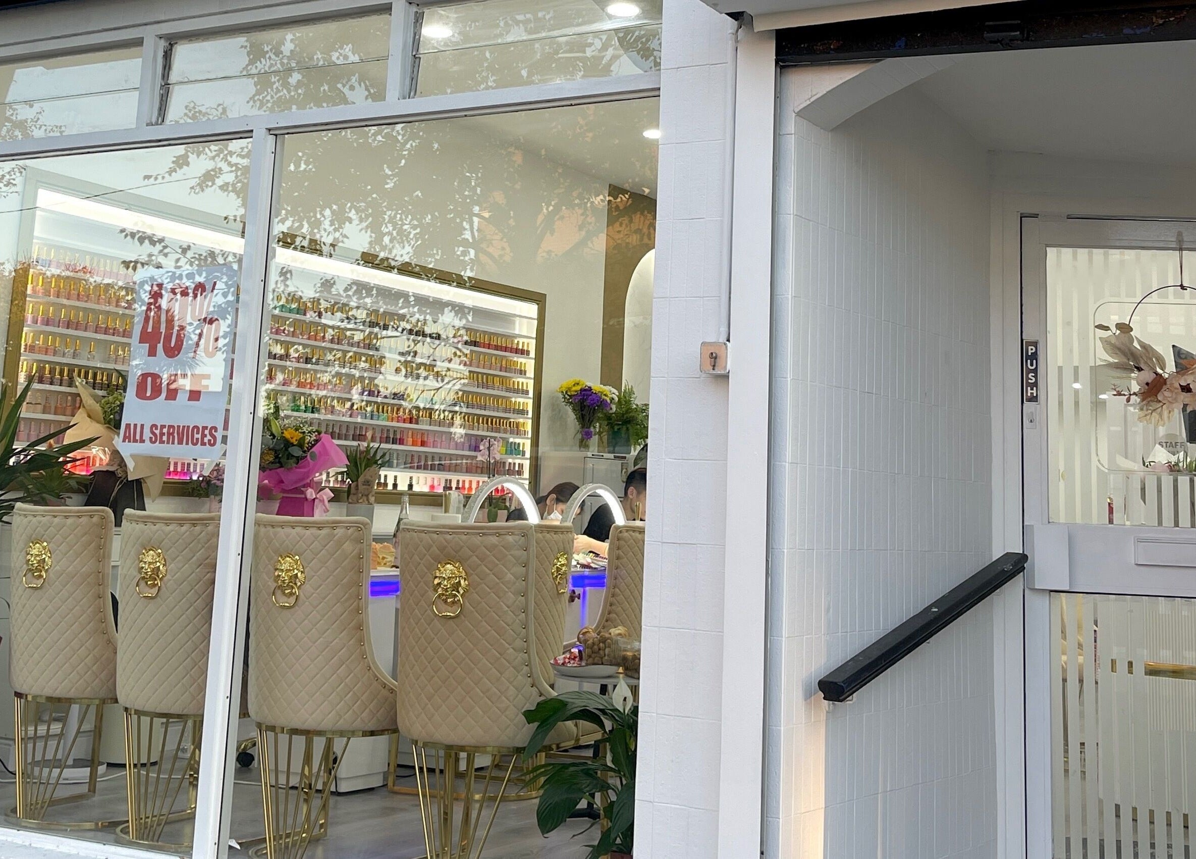 Front view of Amazing Nails & Spa, Dublin, County Dublin, IE with chic interior and 40% off sign.