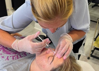 Aesthetic treatment at Angel Face, Shildon, England. Therapist administering care with precision.