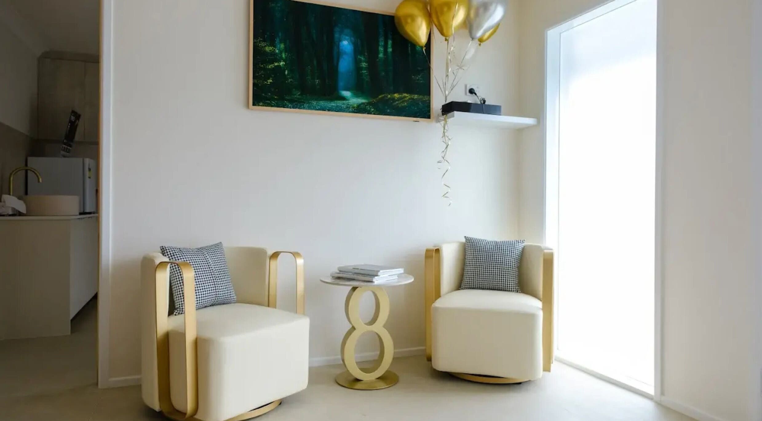 Elegant seating with gold accents at iBeauty Cosmetic Clinic, Bundall, Queensland, AU, offering a serene ambiance.