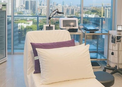 Relaxing treatment room at Gold Coast Hair Transplant Centre, Southport, Queensland, AU with city view.