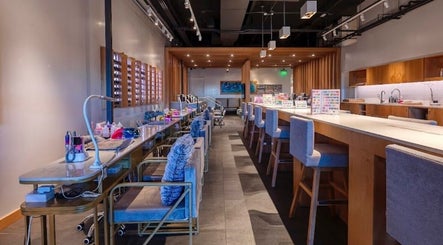 Chic interior of It's Nailsdate in Scottsdale, Arizona, US, featuring stylish nail stations and decor.