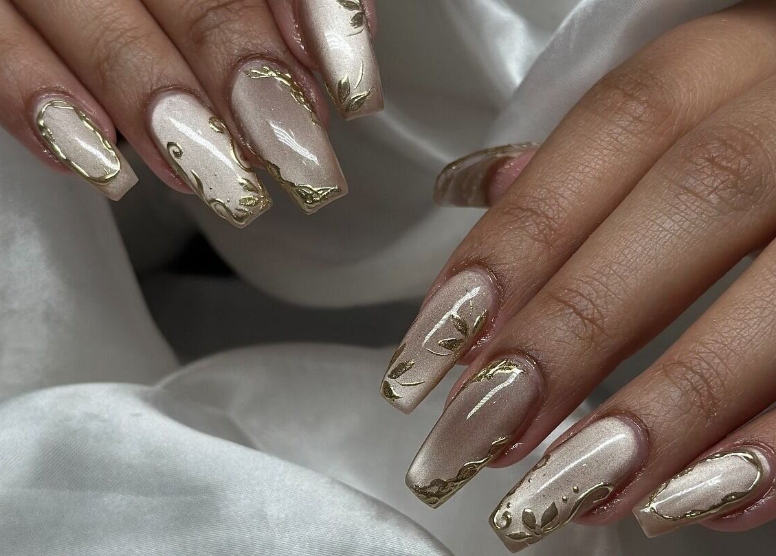 Elegant gold-accented manicure from The Nail And Beauty Lounge, North Adelaide, South Australia, AU.
