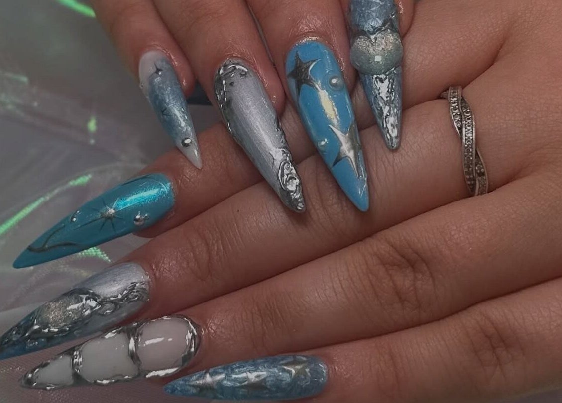 Intricate blue and silver nail art design at The Nail And Beauty Lounge, North Adelaide, South Australia, AU.
