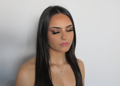 Woman with elegant makeup at Veloura Artistry, Flinders, New South Wales, AU.