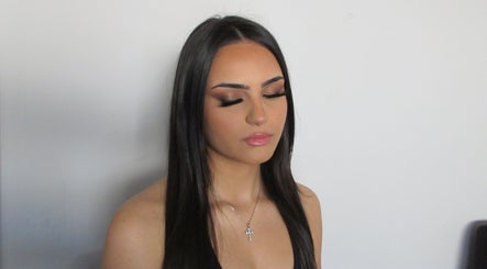 Woman with elegant makeup at Veloura Artistry, Flinders, New South Wales, AU.