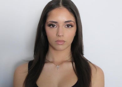 Model with elegant makeup at Veloura Artistry, Flinders, New South Wales, AU showcasing beauty services.