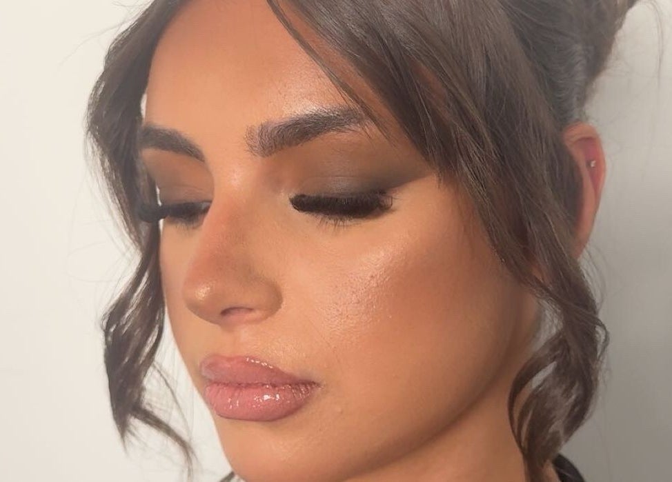 Elegant makeup look by Veloura Artistry, Flinders, New South Wales, AU with smoky eyes and glossy lips.