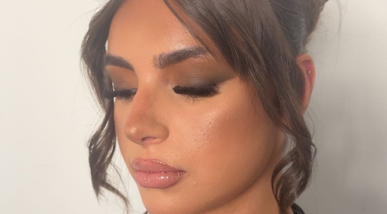 Elegant makeup look by Veloura Artistry, Flinders, New South Wales, AU with smoky eyes and glossy lips.