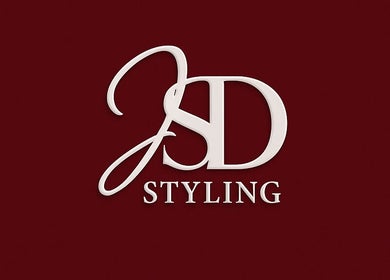 Logo raffiné de JSD STYLING à Villeneuve d’Ascq, Hauts-de-France, FR sur fond bordeaux.