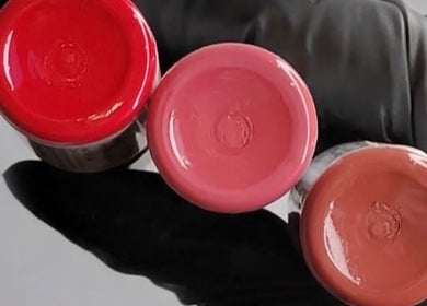 Colorful pigment jars at LUXE skincare, Melbourne, Victoria, AU. Perfect for beauty treatments.