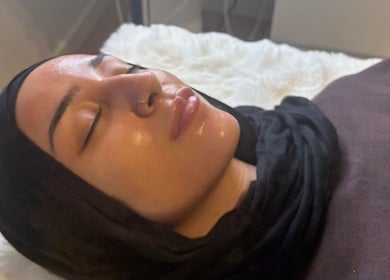 Facial treatment at LUXE Skincare, Melbourne, Victoria, AU. A client receives a relaxing glowing facial.