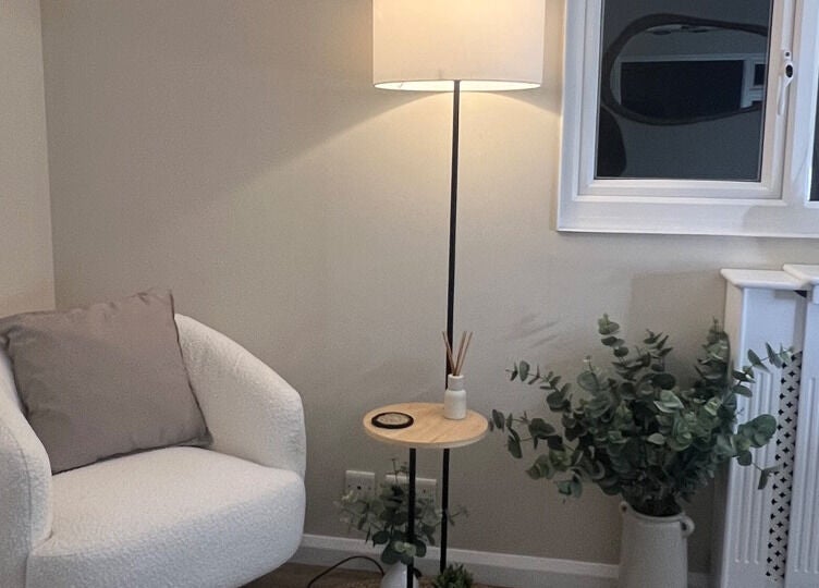 Inviting corner with a plush chair and elegant decor at Babylon, Ramsey, England, GB.