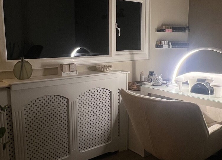 Cozy beauty treatment room at Babylon in Ramsey, England, GB, with ambient lighting and modern decor.