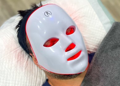 Light therapy mask treatment at Dermaplastic Aesthetic Centre, Klerksdorp, North West, ZA for glowing skin.
