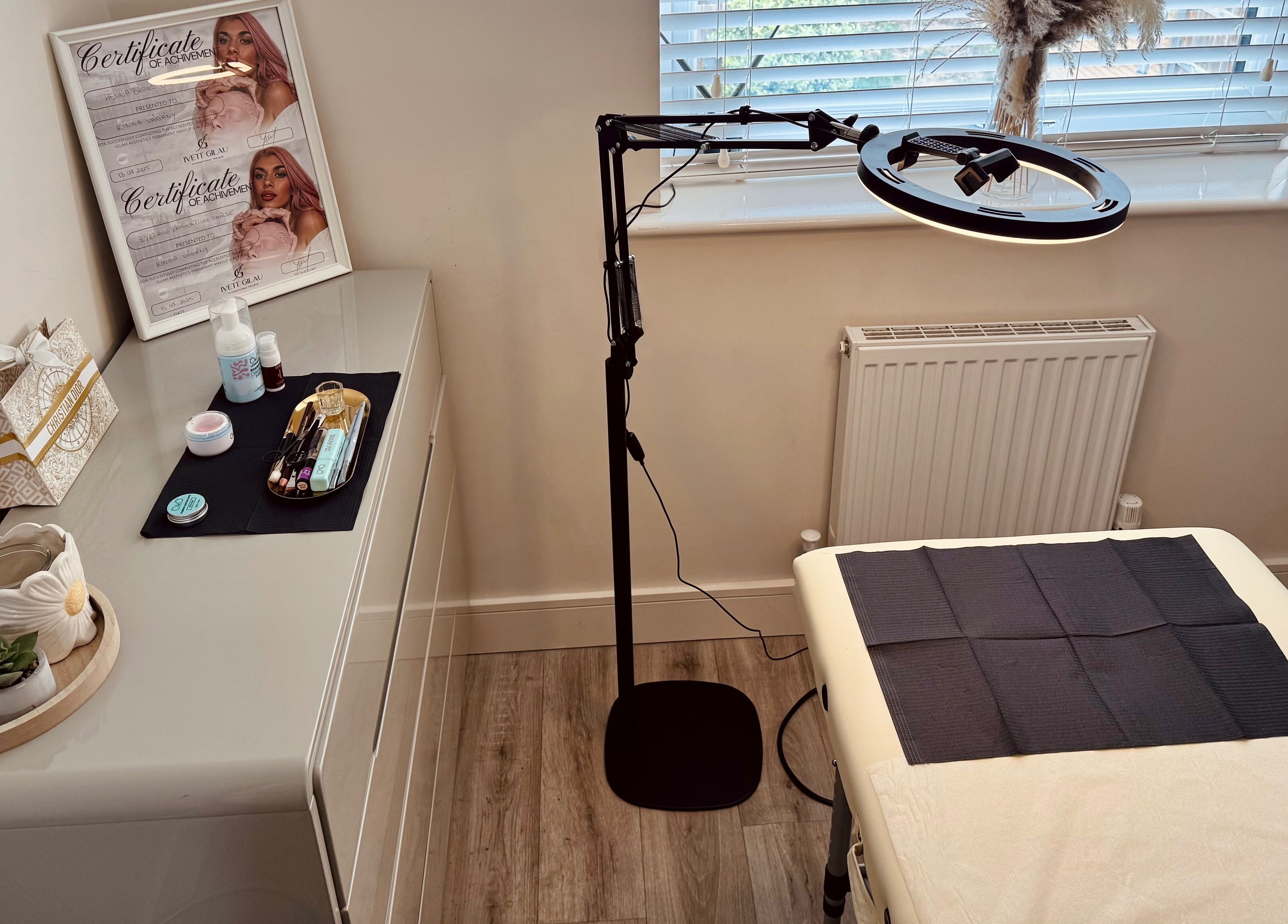 A serene treatment setup at Studio K. Beauty By Kinga, Houghton Regis, England, GB featuring a well-lit workspace.