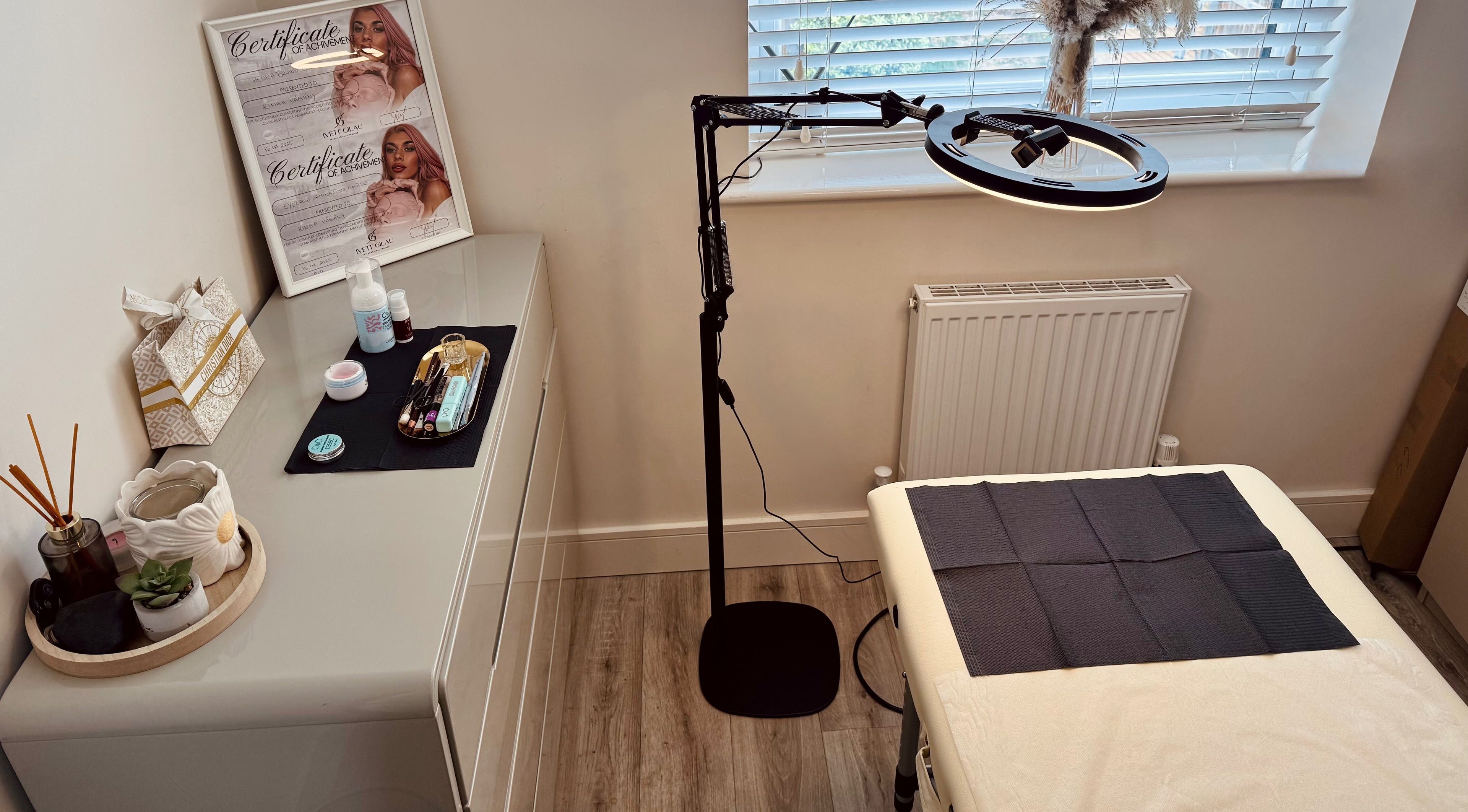 A serene treatment setup at Studio K. Beauty By Kinga, Houghton Regis, England, GB featuring a well-lit workspace.
