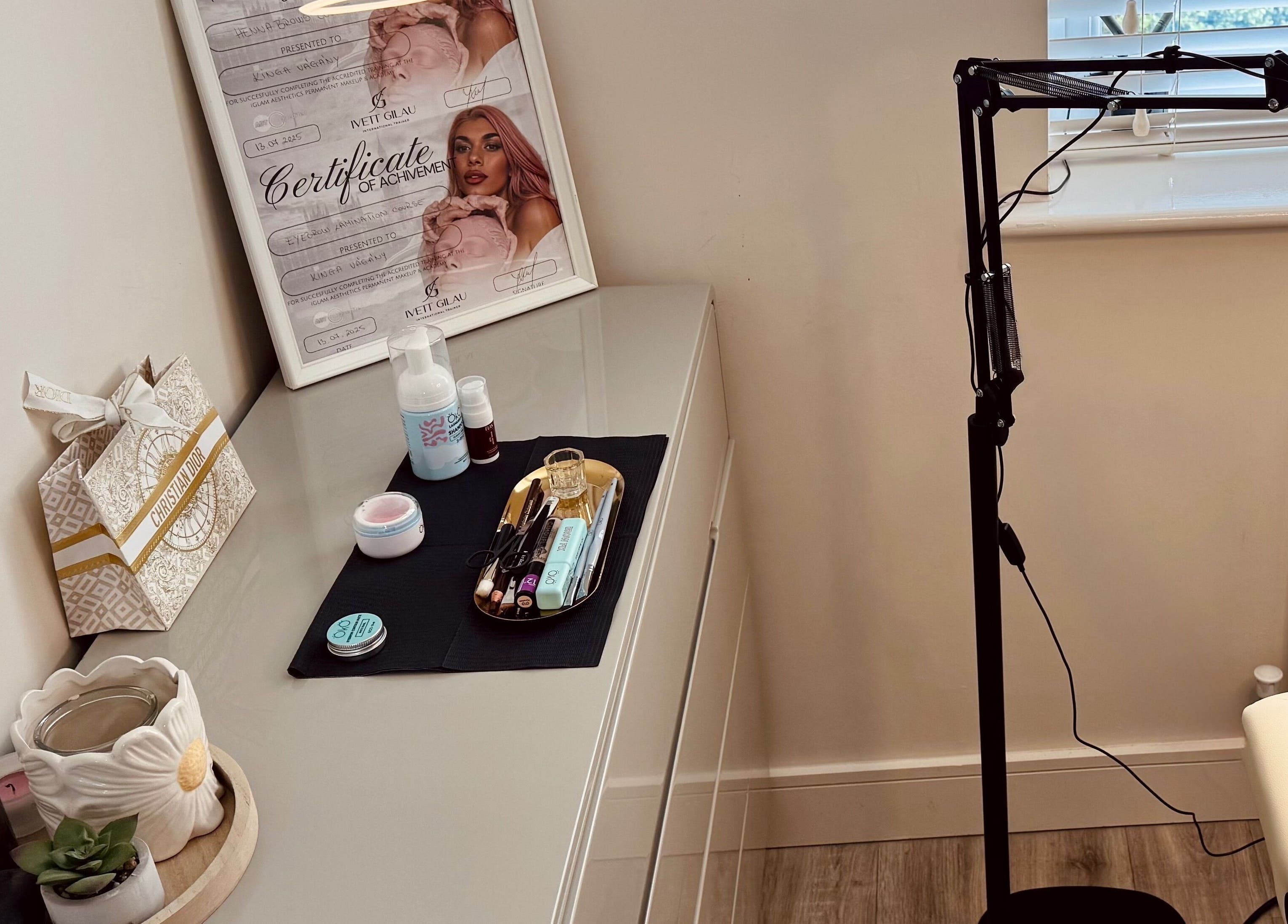 Workspace at Studio K. Beauty By Kinga, Houghton Regis, England, showing tools and decor.