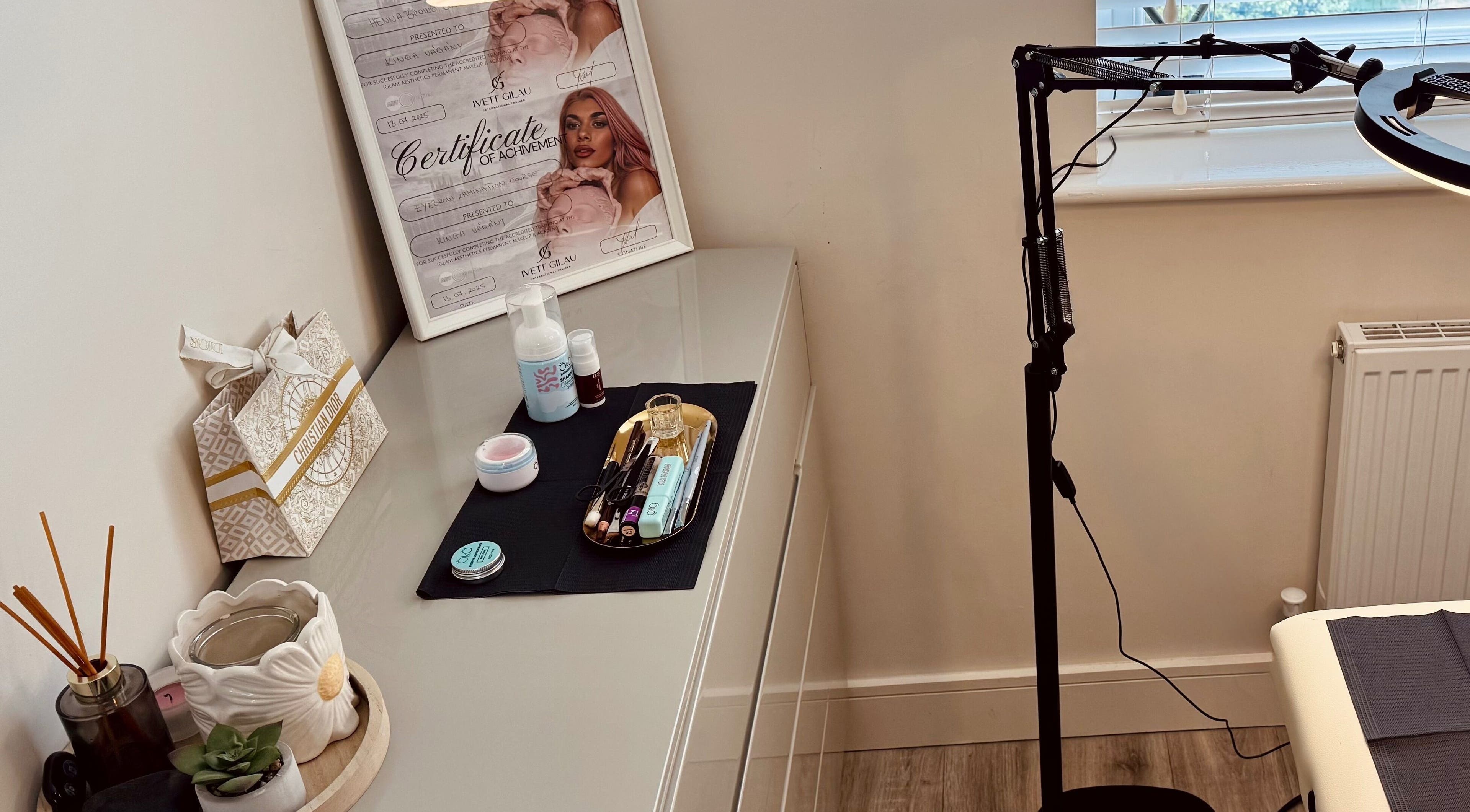 Workspace at Studio K. Beauty By Kinga, Houghton Regis, England, showing tools and decor.