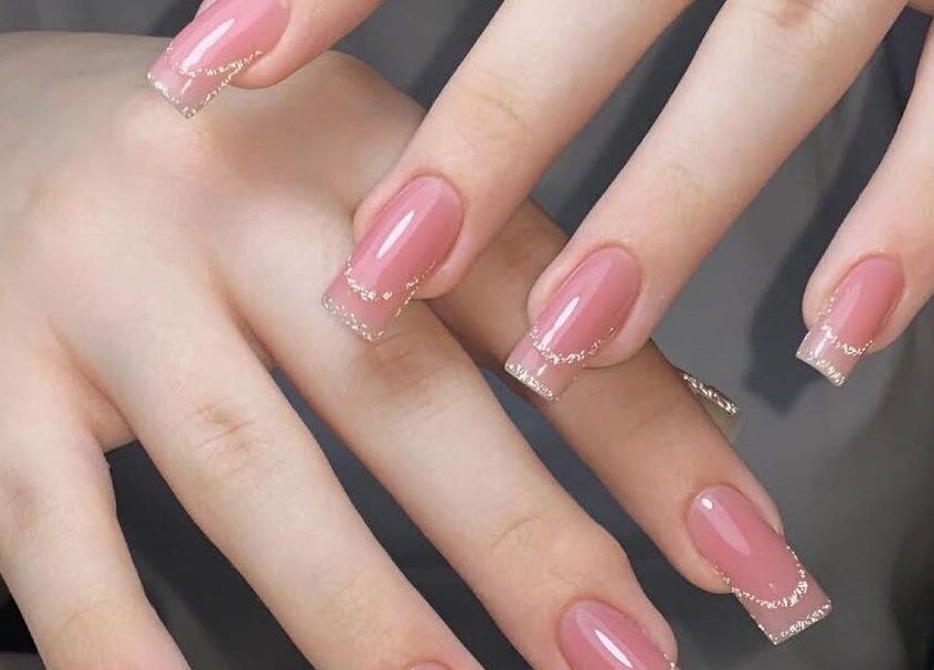 Elegant pink nails with glitter at La Rosé Des Beauté Nails in Randburg, Gauteng, ZA.