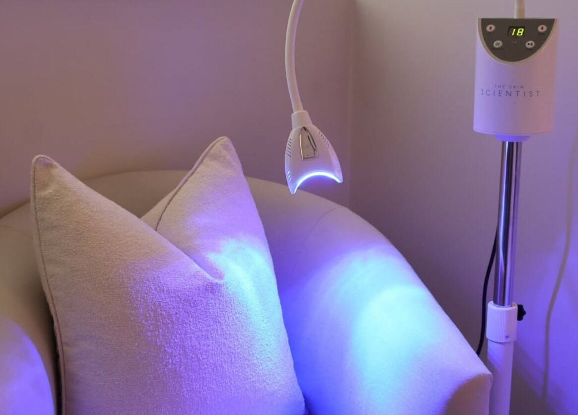 Relaxing chair with LED therapy lamp at The Beauty Scientist, Hurstville, New South Wales, AU.