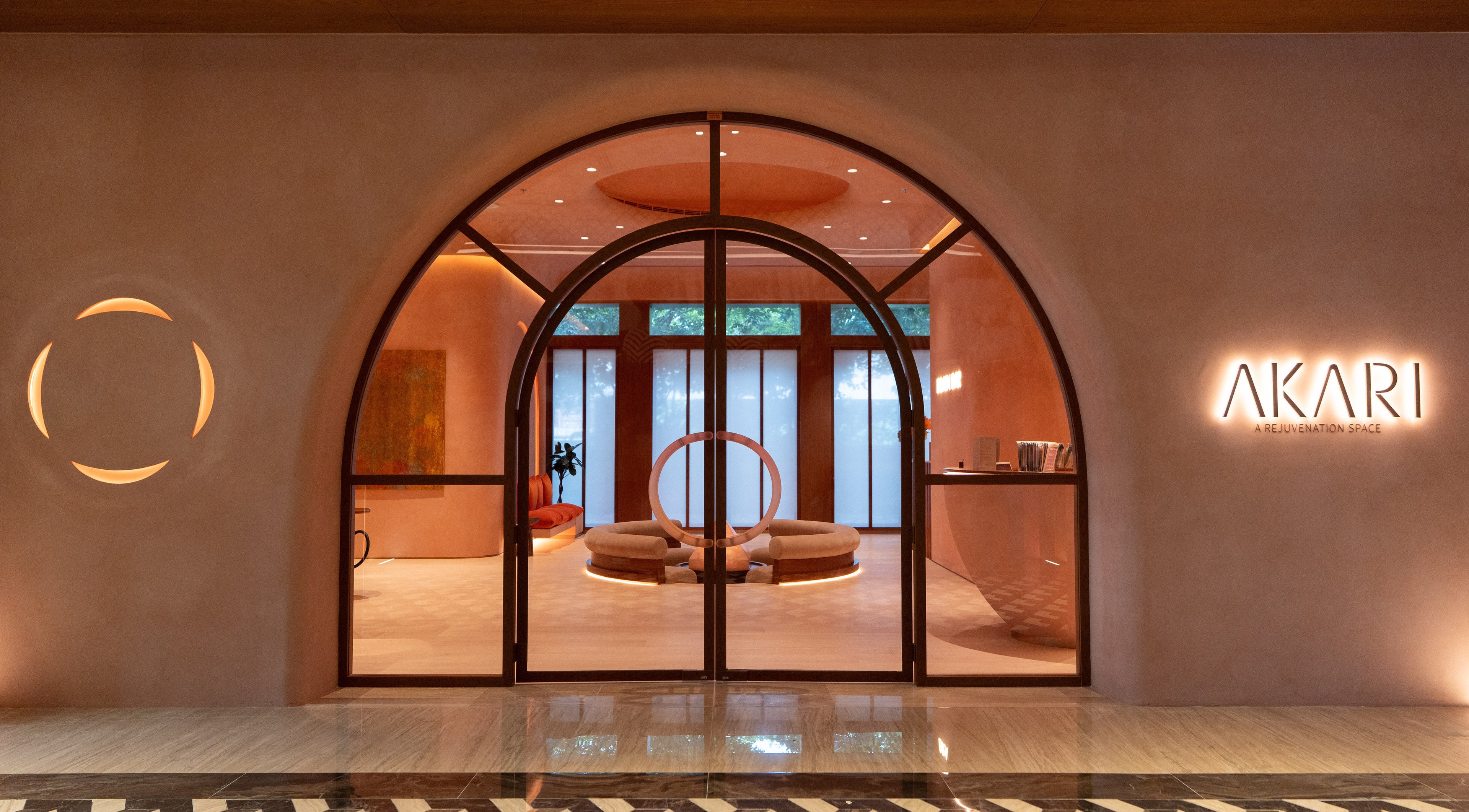 Stylish entrance of AKARI in District, دبي, AE showcasing modern design and warm lighting.