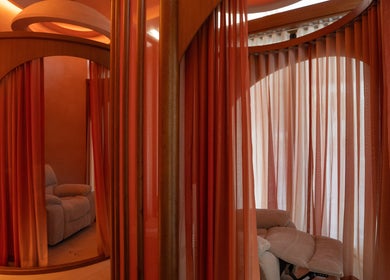 Elegant relaxation space with curtains at AKARI, District, دبي, AE offering a tranquil atmosphere.