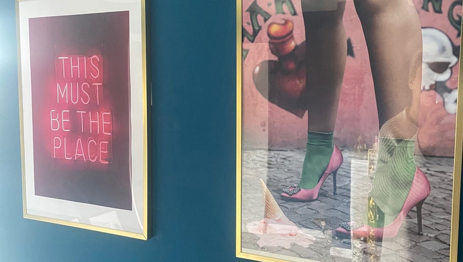 Colorful art on display at Sabrina’s salon in Brighton, England, GB, creating a stylish and inviting atmosphere.