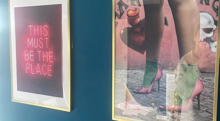 Colorful art on display at Sabrina’s salon in Brighton, England, GB, creating a stylish and inviting atmosphere.