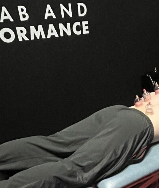 Cupping therapy session at T.N Sport Therapy, Llanelli, Wales, GB, enhancing rehab and performance.