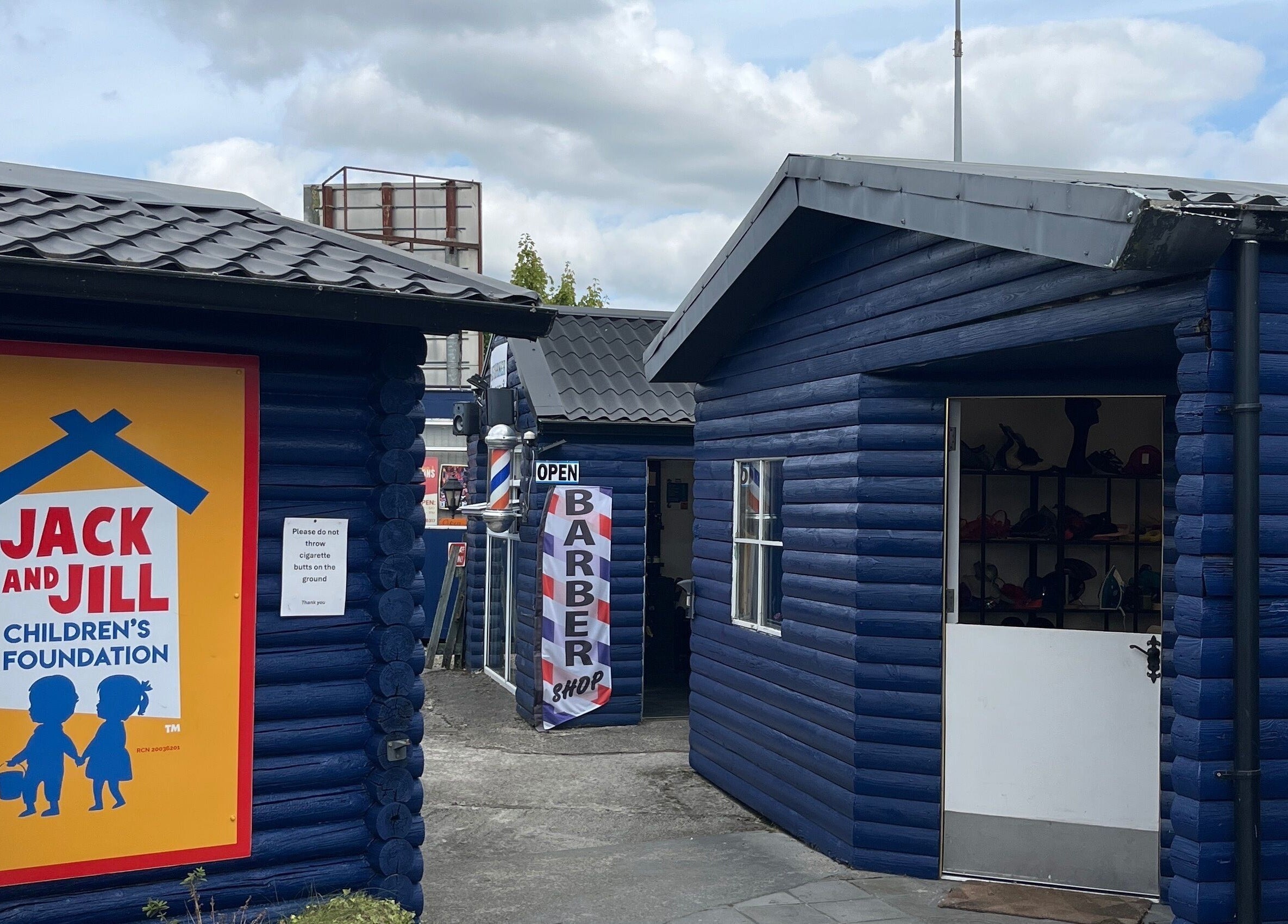 Cutcorner barbershop with blue log walls in County Kildare, County Kildare, IE.