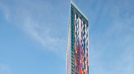 Colorful high-rise near JZ Nailed It, Croydon, England, GB, showcasing modern architectural design.