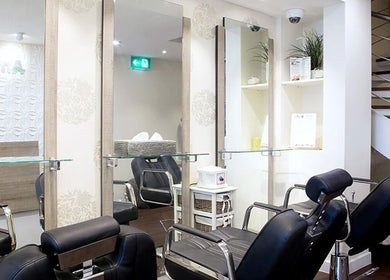 Modern salon interior at Anya Spa@Angel in London, England, GB with stylish chairs and elegant décor.