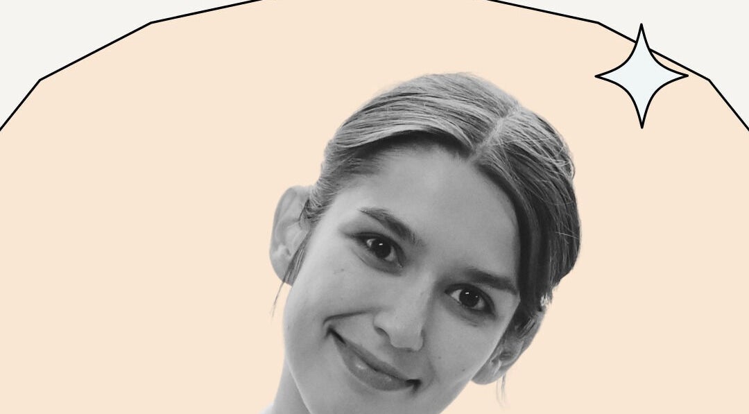 A smiling individual with a creative background at Coolbabatattoo, New York, US showcases artistic beauty.