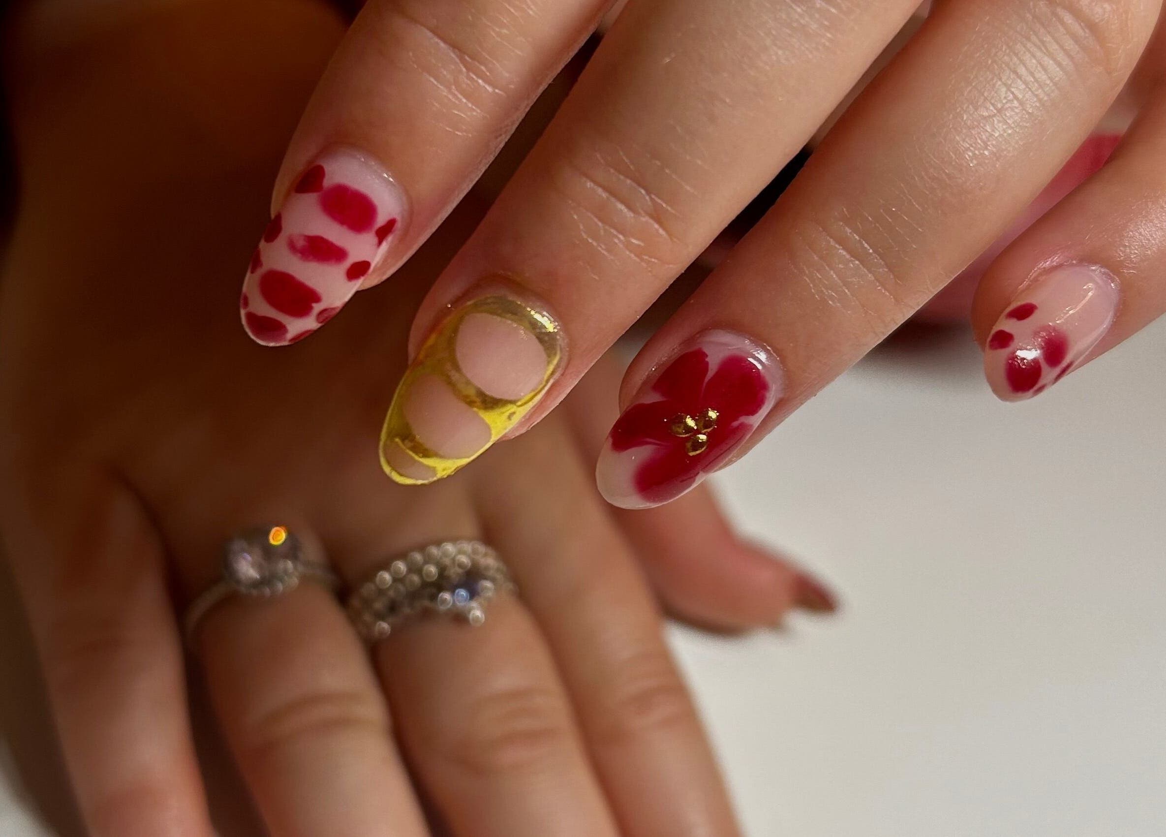 Beautiful red and gold nail art at Nails By Katie, Coleraine, Northern Ireland, GB.