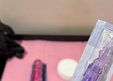 Beauty tool and supplies on pink table at Honey Beauty in Jeddah, Makkah Province, SA.