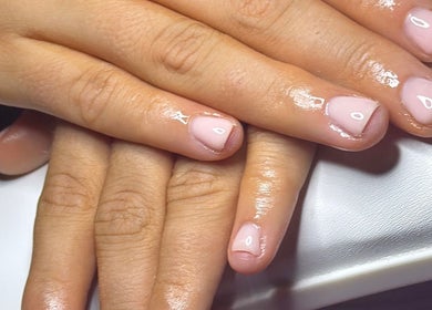 Elegant manicure from Nails_bylauryn in Bedford, England, GB showcasing glossy, neatly polished nails.
